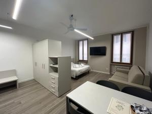 A bed or beds in a room at Residenza della Samaritana Classici
