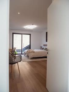 Een bed of bedden in een kamer bij Casa Luxe