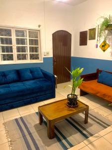 Posezení v ubytování Casa ampla com piscina 4 quadras da praia , Espaço gourmet churrasqueira
