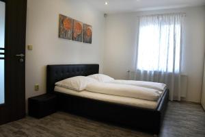 Postel nebo postele na pokoji v ubytování Apartmán Hrušky