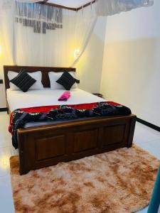 Letto o letti in una camera di Tea Pick View Ella