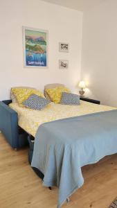 เตียงในห้องที่ Studio Tout à Pied - Vue Sur Mer