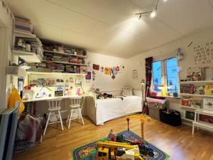 a bedroom with a bed and a toy truck in it at Nice semi-detached house in central Landvetter in Landvetter