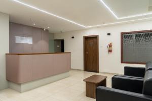 The Living Hub Business Hotel, Kolhapur大厅或接待区