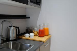 Kuchyň nebo kuchyňský kout v ubytování 5Rooms
