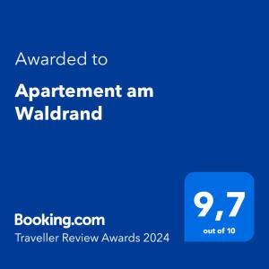 a blue screen with the text awarded to agreement am waleland at Apartement am Waldrand in Bad Wildbad