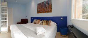 Postel nebo postele na pokoji v ubytování 5Rooms