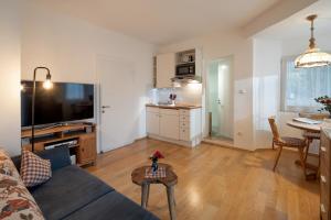 Kuchyň nebo kuchyňský kout v ubytování Rosenhof am See Ferienwohnung Enzian