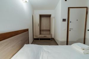 Postel nebo postele na pokoji v ubytování Hotel Alla Sosta