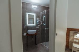 Koupelna v ubytování Hotel Alla Sosta