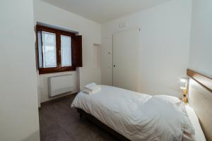 Postel nebo postele na pokoji v ubytování Hotel Alla Sosta