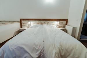 Postel nebo postele na pokoji v ubytování Hotel Alla Sosta