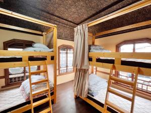 Voodi või voodid majutusasutuse Hostel Miyagawa by Murasaki toas