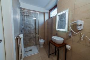 Koupelna v ubytování Hotel Alla Sosta