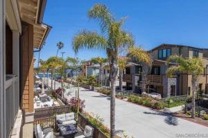 a view of a street with palm trees and condos at Bayside Cove 4 in San Diego