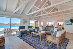 a living room with a couch and chairs at Boardwalk 4 in San Diego