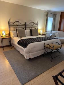 Postel nebo postele na pokoji v ubytování Corzo Hotel