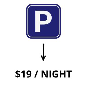 una señal con el precio de un estacionamiento en 1515 SECRT Sabana Hermoso Apartamento Totalmente Equipado, en San José