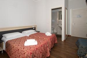 Postel nebo postele na pokoji v ubytování Villa Gioia