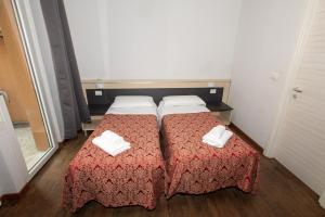 Postel nebo postele na pokoji v ubytování Villa Gioia