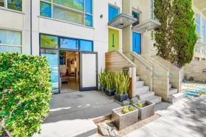 a building with a door and stairs in front of it at Kettner Row 1 in San Diego