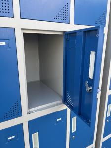 a blue locker room with blue doors and shelves at Wies'n Camp in Munich +6 photos