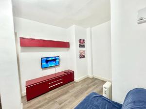 Telewizja i/lub zestaw kina domowego w obiekcie Madrid Rio Antonio Lopez A