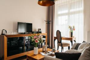 TV a/nebo společenská místnost v ubytování Topolowa Residence - LoftAffair Collection