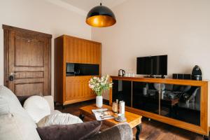 TV a/nebo společenská místnost v ubytování Topolowa Residence - LoftAffair Collection