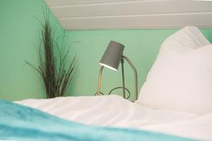 Ein Bett oder Betten in einem Zimmer der Unterkunft Perouser Wohlfühloase