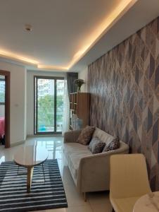 Гостиная зона в Laguna Beach Resort 3 The Maldives