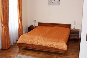 En eller flere senge i et værelse på Olymp penzion