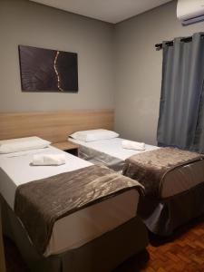 Letto o letti in una camera di Unity Hotel - Paulista - SP