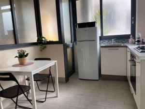 Kuchyň nebo kuchyňský kout v ubytování Nonna Rosa (10 min to Pompei)