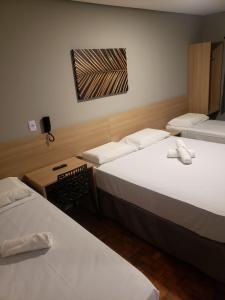 Letto o letti in una camera di Unity Hotel - Paulista - SP