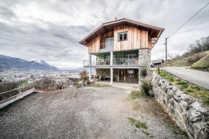 a house on the side of a hill at Appartement proche station - 7 pers in Châtillon-sur-Cluses