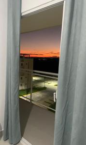a view of a sunset seen through a window at Punta Cana in Punta Cana