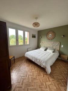 Postel nebo postele na pokoji v ubytování Le gîte de Marie