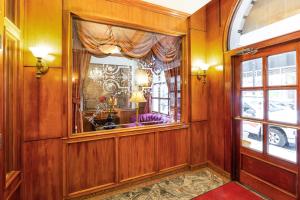 a hallway with a window in a building at Hotel St. James in New York