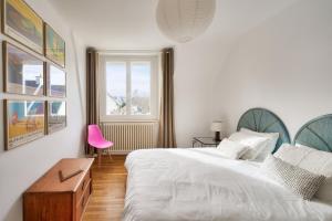 Ένα ή περισσότερα κρεβάτια σε δωμάτιο στο 350m de la plage - meublé 4 étoiles pour 8 avec jardin