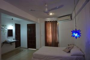 Hostelito Hotel客房内的一张或多张床位