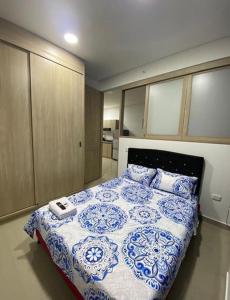 מיטה או מיטות בחדר ב-Apto Villalba
