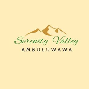 a logo for a sanctuary valley amulahuagency at Serenity Valley Ambuluwawa Resort in Kandy