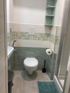 a small bathroom with a toilet and a sink at Keteia - Amalfi Coast in Cetara