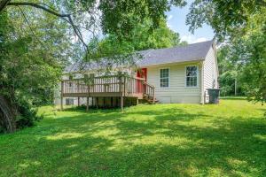 a house with a large yard with a deck at Private Home 6miles to downtown 4 miles to airport in Nashville