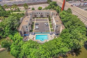 an overhead view of a mansion with a swimming pool at Walk to Broadway Riverfront Condo with Pool in Nashville