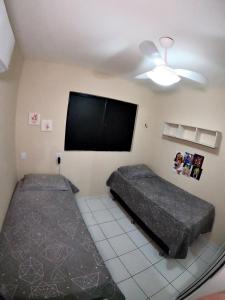 Postel nebo postele na pokoji v ubytování Apartamento em Ponta Negra _ Natal RN