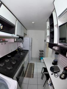 Kuchyň nebo kuchyňský kout v ubytování Apartamento em Ponta Negra _ Natal RN