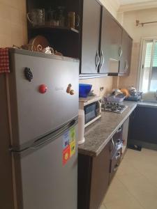 Köök või kööginurk majutusasutuses Appartement spacieux, exceptionnel