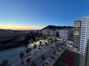 an aerial view of a city with a street and buildings at Apto. Cullera vistas espectaculares primera línea in Cullera